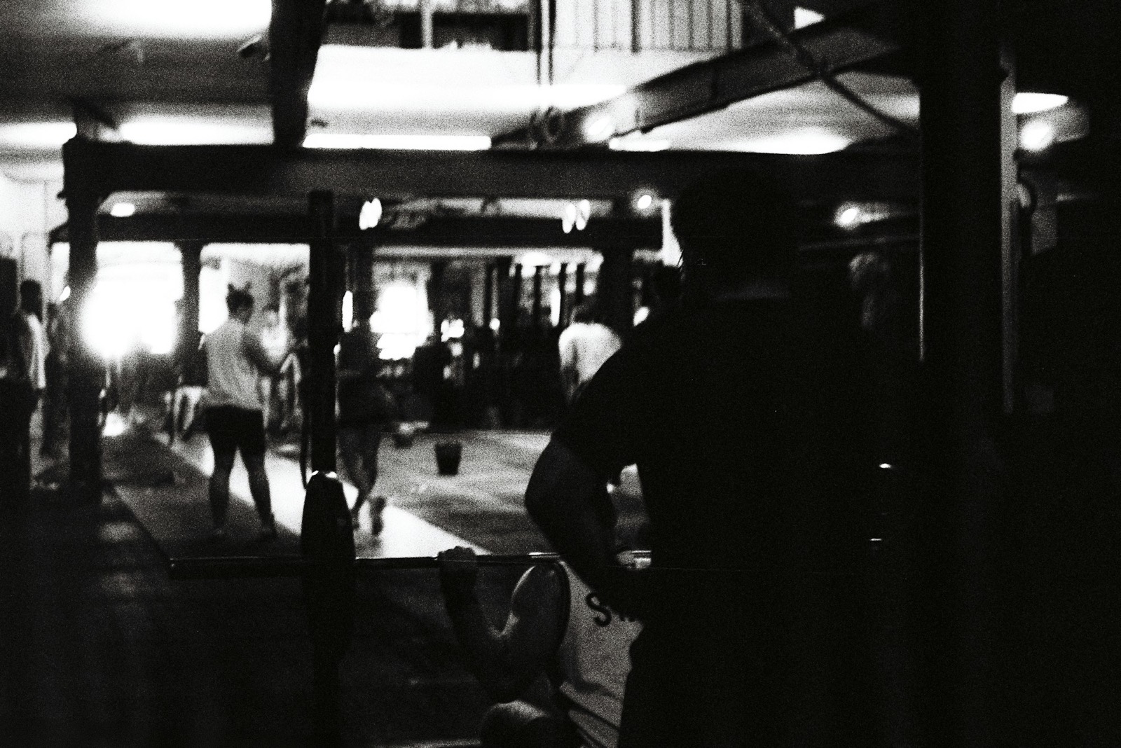 Athlete training in a gym at dawn